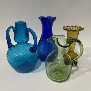 Lot of four glass vases